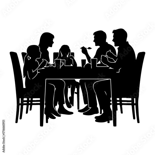 Family eating together at table dining meal