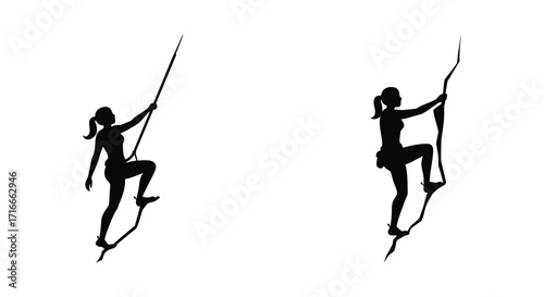 Silhouette of a female rock climber ascending a vertical climbing wall