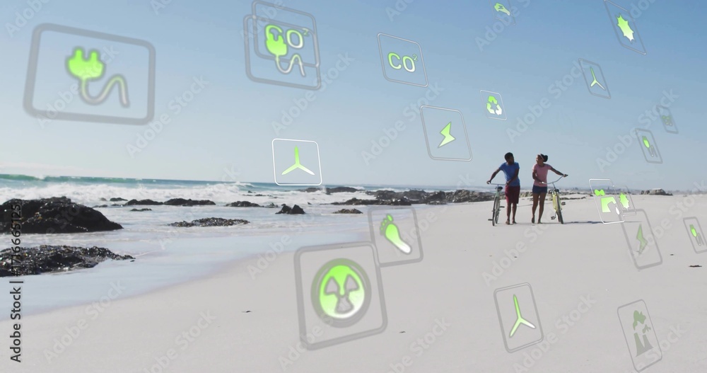 Naklejka premium Walking couple wearing casual clothes along beach with bicycle, longboard, energy icons, copy space