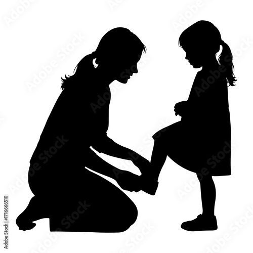 Mother helps child put on shoes daughter helping