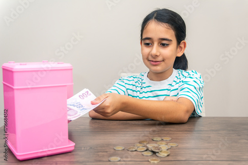 The happiness of the girl who took money from her piggy bank