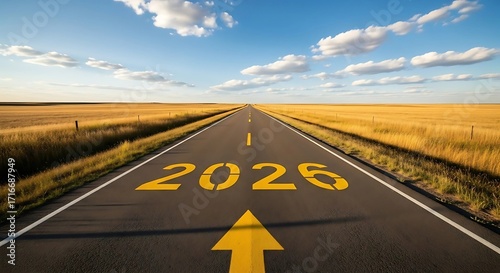Clear Blue Sky and Road Marked 2026 with Arrow in Open Countryside Landscape