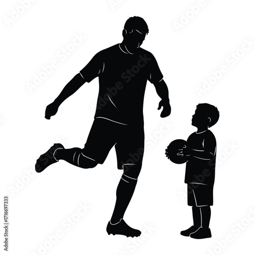 Father and son playing soccer child
