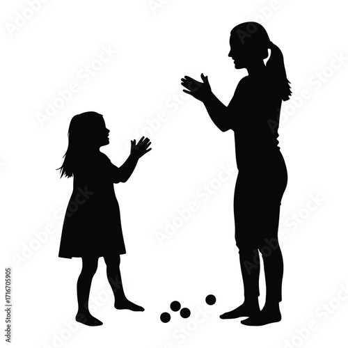 Mother and child playing with balls silhouette daughter