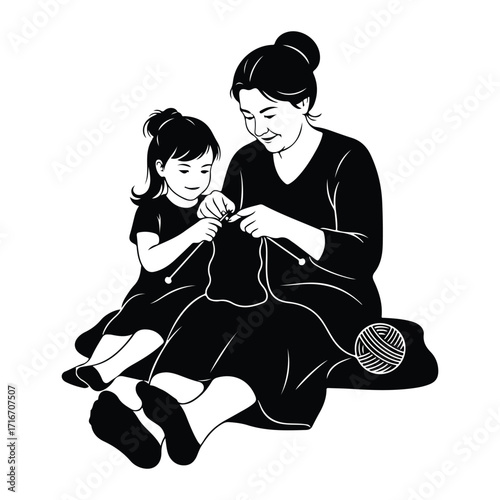 Mother and daughter knitting together yarn needles