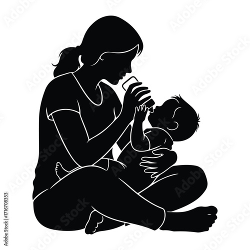 Mother feeding baby with bottle infant