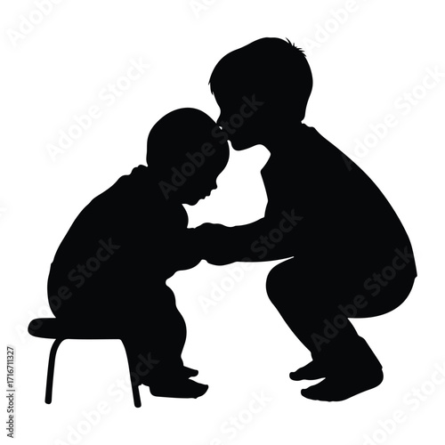 Older sibling comforting younger child silhouette children