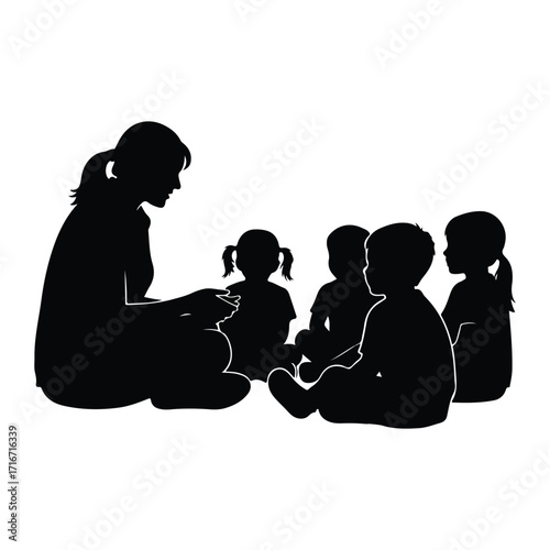 Teacher reading to children story time group