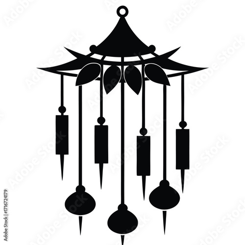 Black Silhouette Image of Intricate Wind Chime with Decorative Elements and Hanging Ornaments