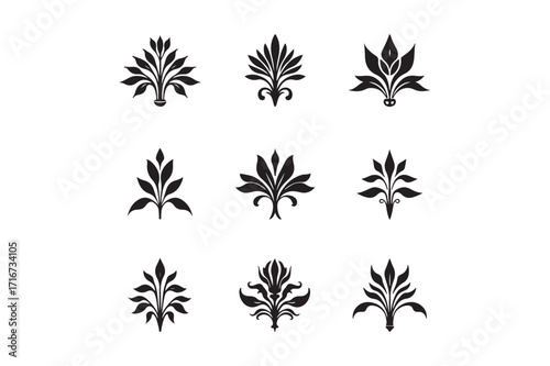Collection of nine black decorative floral ornaments
