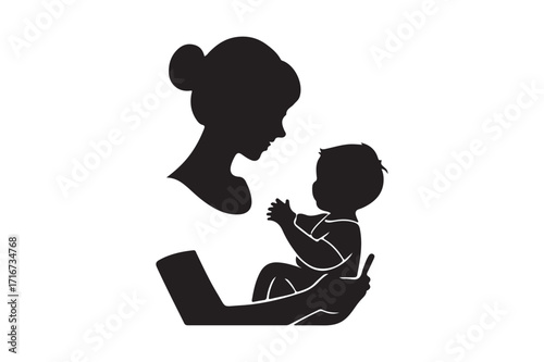 Silhouette of a mother holding her baby close