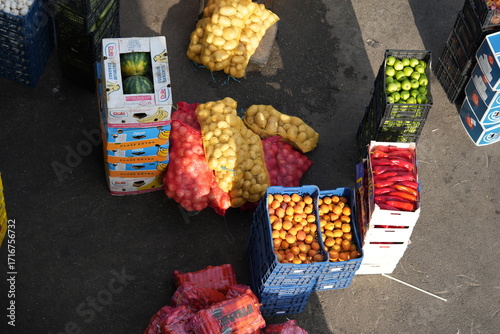 Food delivery to hotel – top view of fresh fruits, vegetables, bottled water and packaged goods in boxes and bags, catering and hospitality supply logistics background for restaurant, travel and busin