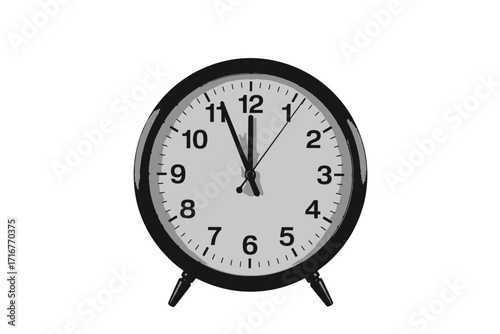 Classic oval alarm clock showing almost twelve oclock