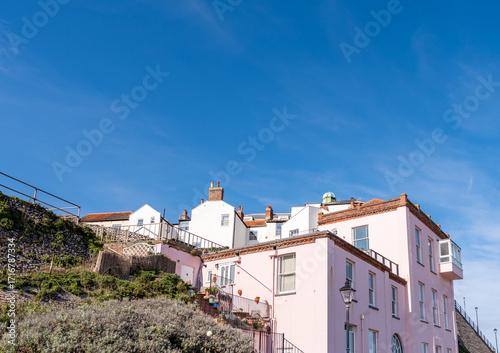 Unidentifiable historic period property bathed in sunlight