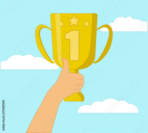 The hand holds the winner's Cup, a prize, against the background of the sky and clouds, first place, award, gold, trophy
