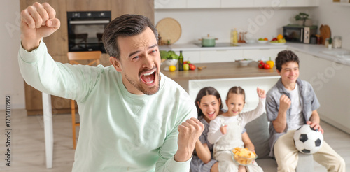 Cheerful father and his fam...
