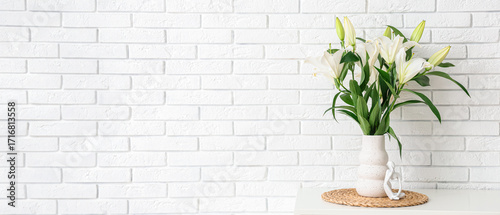 Vase with lily flowers on c...