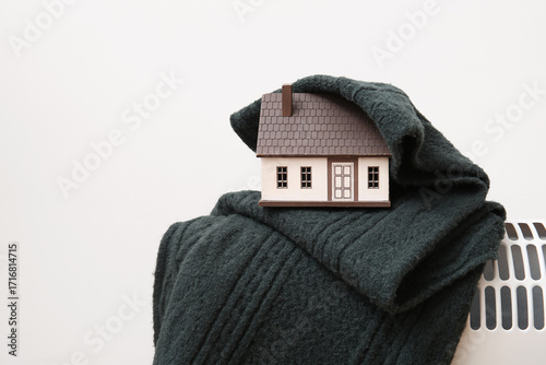 Figure of house with warm s...