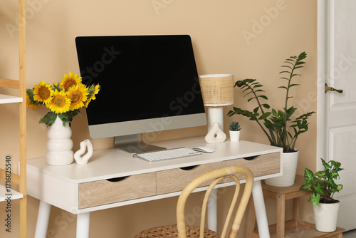 Vase with sunflowers and bl...