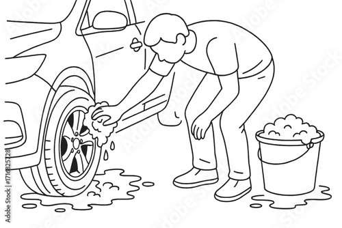 Man washing car tire with sponge and bucket outdoors  