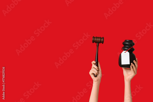 Woman holding auction gavel...