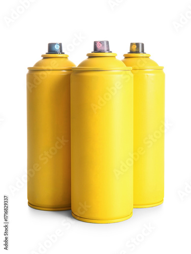 Spray paint cans on white b...
