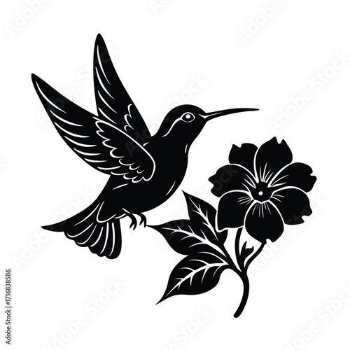 Hummingbird hovering near a flower silhouette in vibrant colors