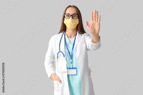 Young female doctor in medi...