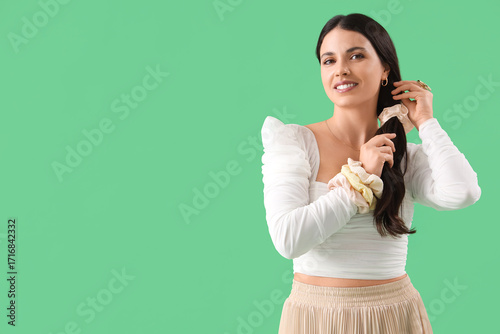 Beautiful woman with scrunc...