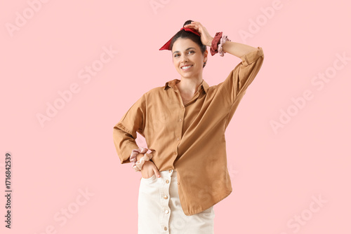 Beautiful woman with bun an...