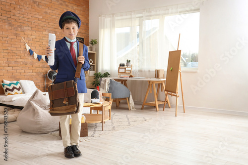 Teenage postman with newspa...