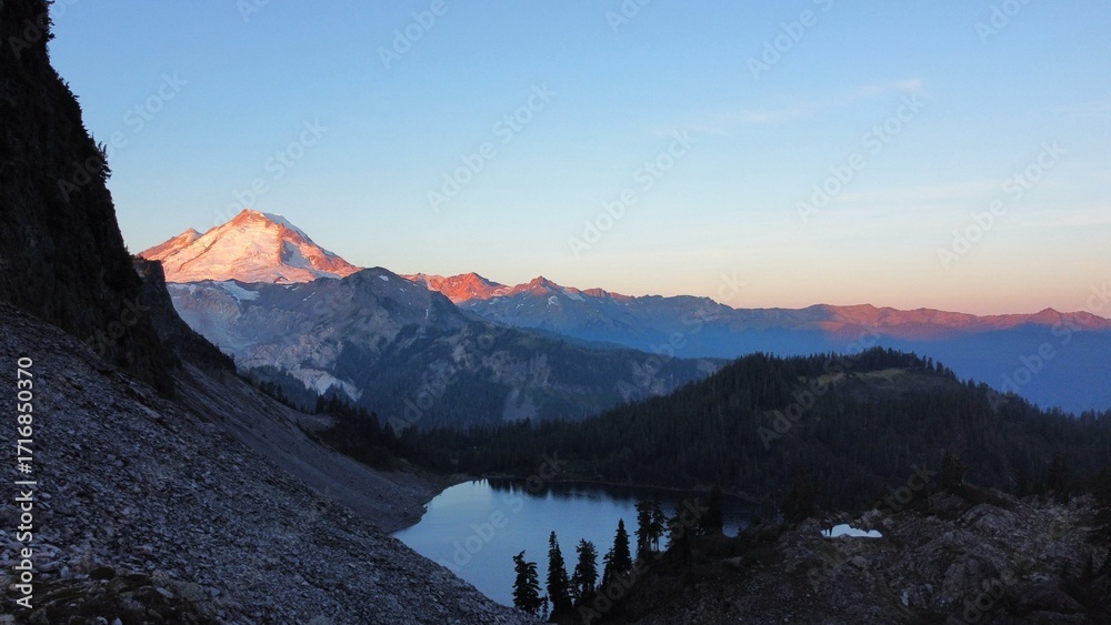 Fototapeta premium Sunrise over the mountain and lake