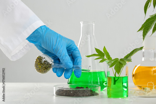 Female scientist's hand wit...