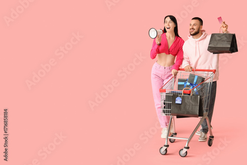 Young couple with shopping ...