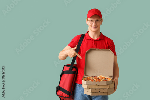 Male courier pointing at ta...