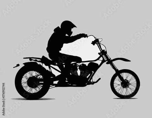 Silhouette of a biker doing freestyle tricks on his motorcycle vector silhouette set