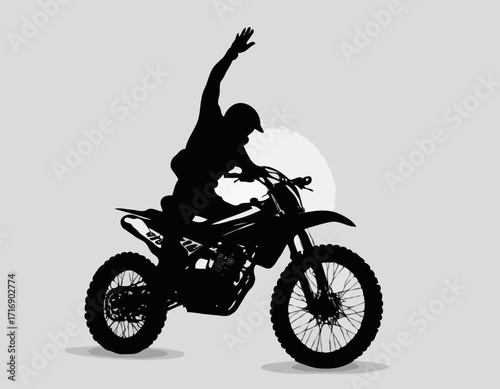 Silhouette of a biker doing freestyle tricks on his motorcycle vector silhouette set