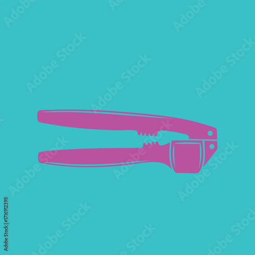 Purple garlic press kitchen utensil isolated on turquoise background cooking tool for crushing garlic cloves
