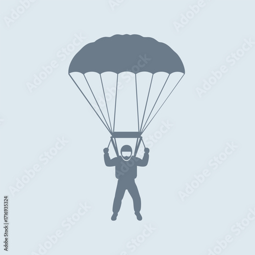 Silhouette of a parachutist descending with an open parachute against a plain light background