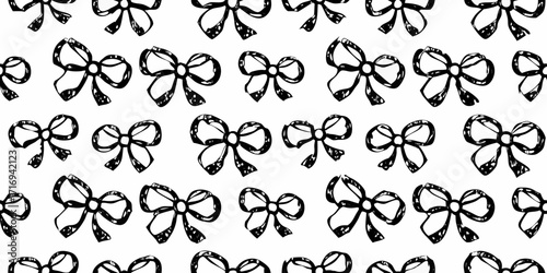 Hand drawn black and white bow pattern seamless texture with repeating bow motifs