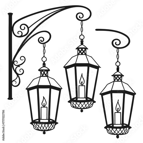 Three hanging lanterns with candles on a scrollwork bracket