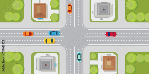 Top down view of a busy city intersection with cars and buildings