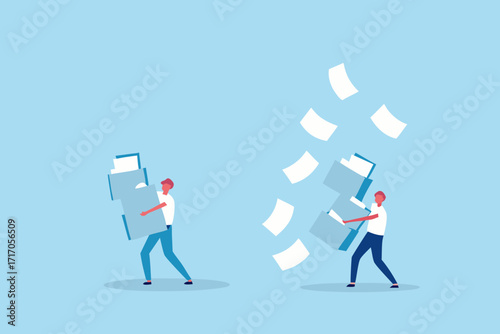 Man struggling to carry a large stack of documents while papers fly around him