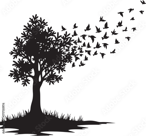 Black silhouette of tree with birds flying from branches