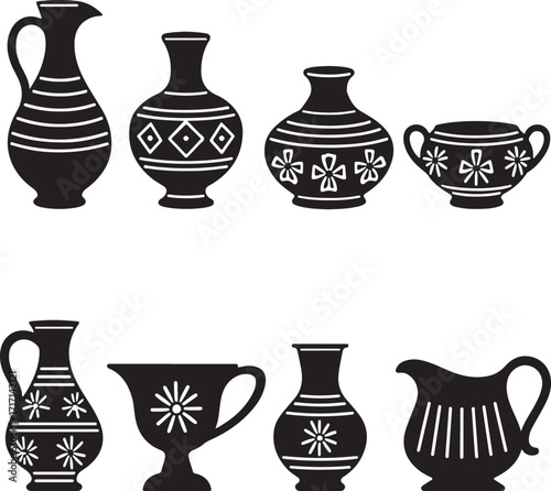 Collection of black ceramic vases and pitchers with white decorative patterns