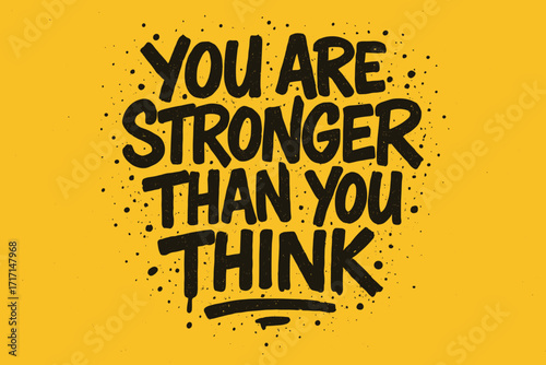You are stronger than you think motivational quote, hand-drawn urban graffiti style typography, rough textured lettering with ink drops and splashes, inspirational vector design
