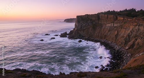 Beautiful cliffside view of the ocean at sunset in sintra, portugal
