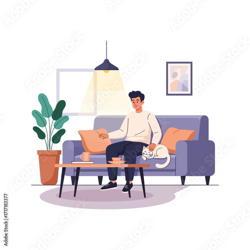Person at desk working on a laptop with a book