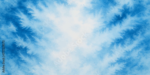 A vast blue sky with fluffy white clouds drifts by on a beautiful summer day
