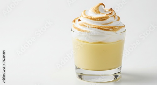 Suspiro limeño dessert glass with meringue top isolated on white background for dessert and food photography